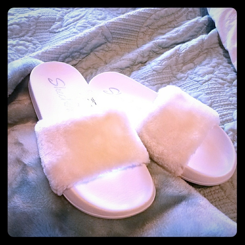 White fuzzy slides